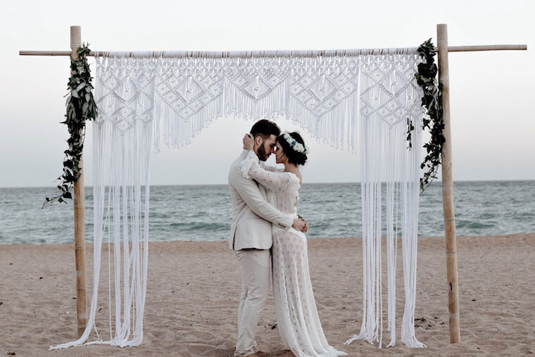 bride and groom beach wedding ceremony