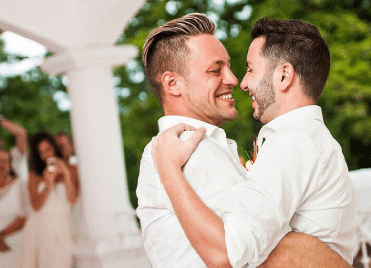 gay couple dancing wedding