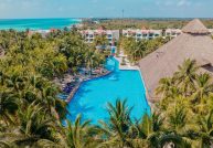 aerial view of the pools and accommodations at el dorado royale