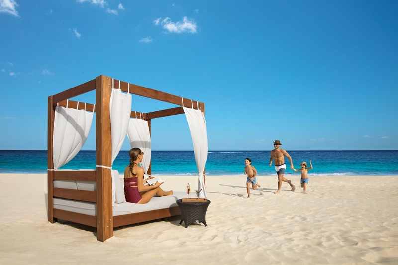 balinese bed on beach cancun family