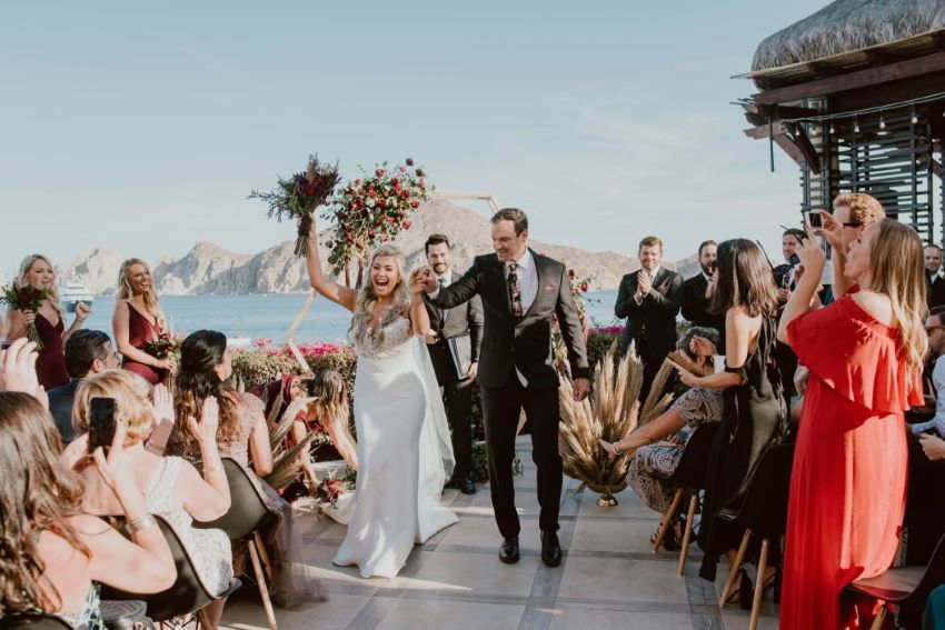 Casa Dorada Los Cabos Resort & Spa terrace wedding venue with bride groom and guests
