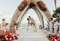 Couple kissing at resort wedding in Mexico