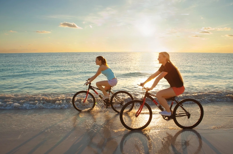 riding bikes on beach