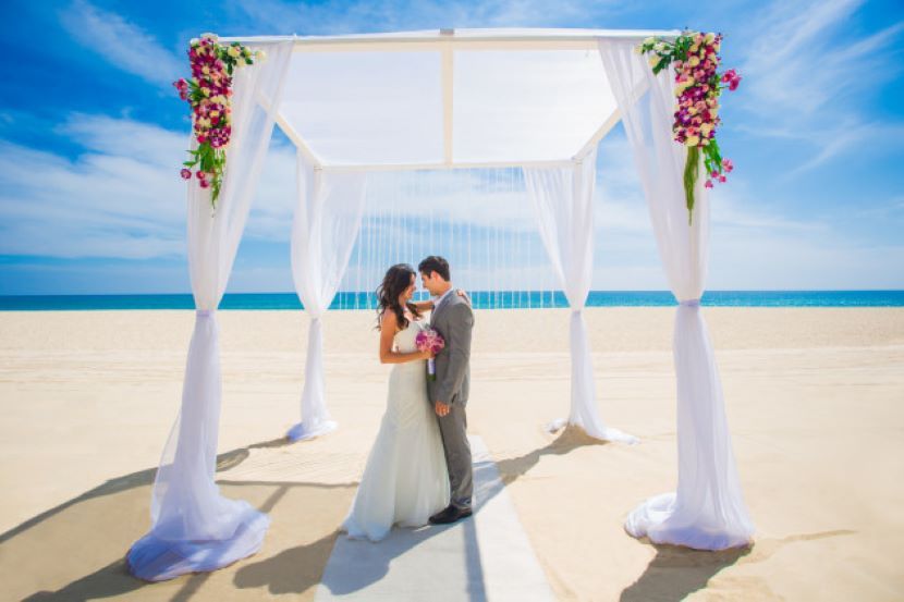 couple getting married on beach at Hyatt Ziva Los Cabos