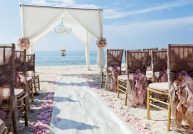 Wedding arch on the beach at El Dorado Casitas Royale