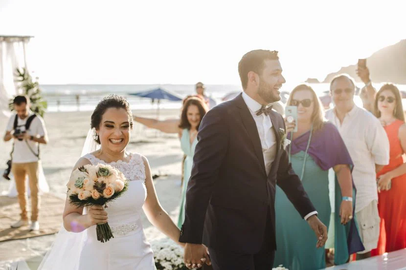 bride and groom on the beach