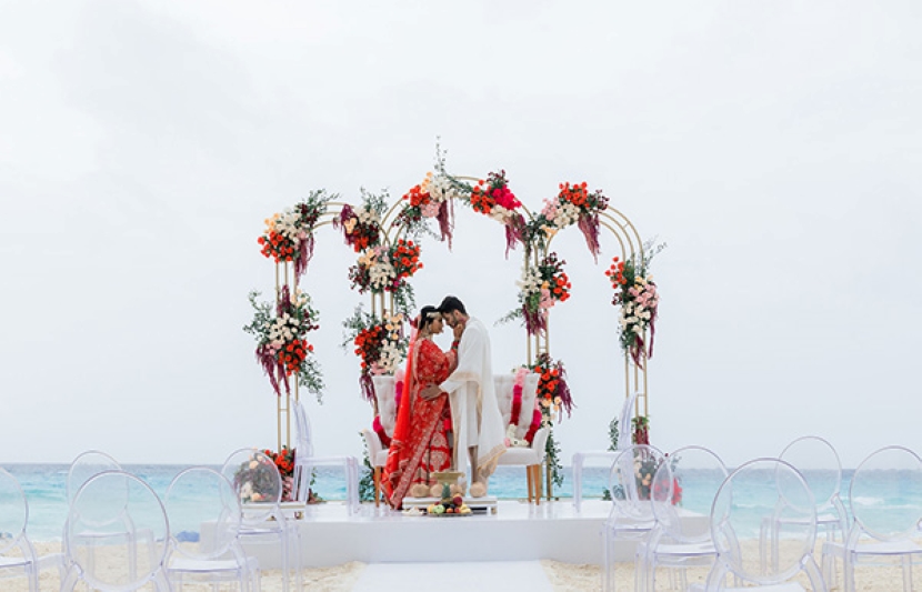 wyndham alltra cancun bride and groom at beach wedding venue