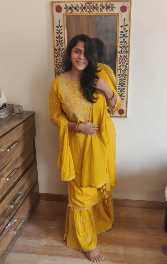 woman wearing a yellow sharara