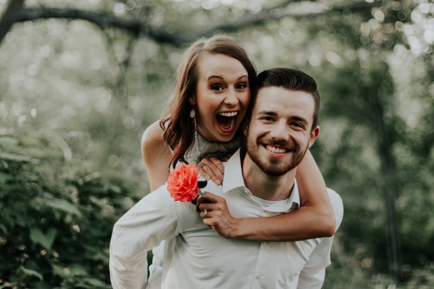 bride and groom smiling