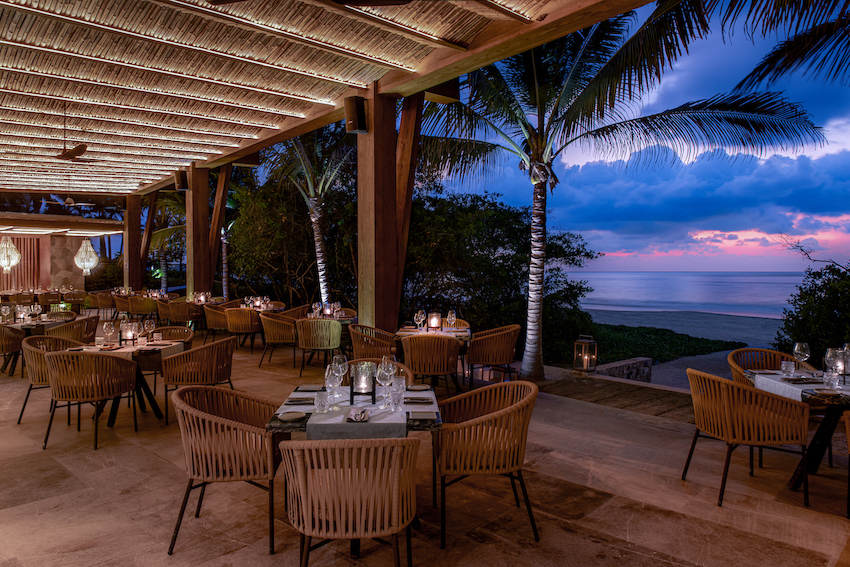 Beachfront restaurant at sunset