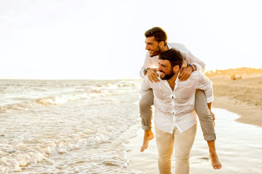 gay couple on the beach