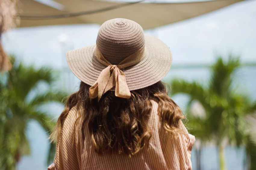 woman wearing a hat