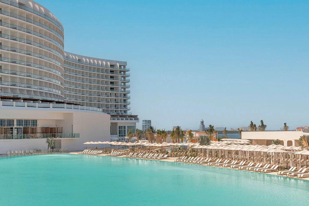 pool and building at AVA Cancun