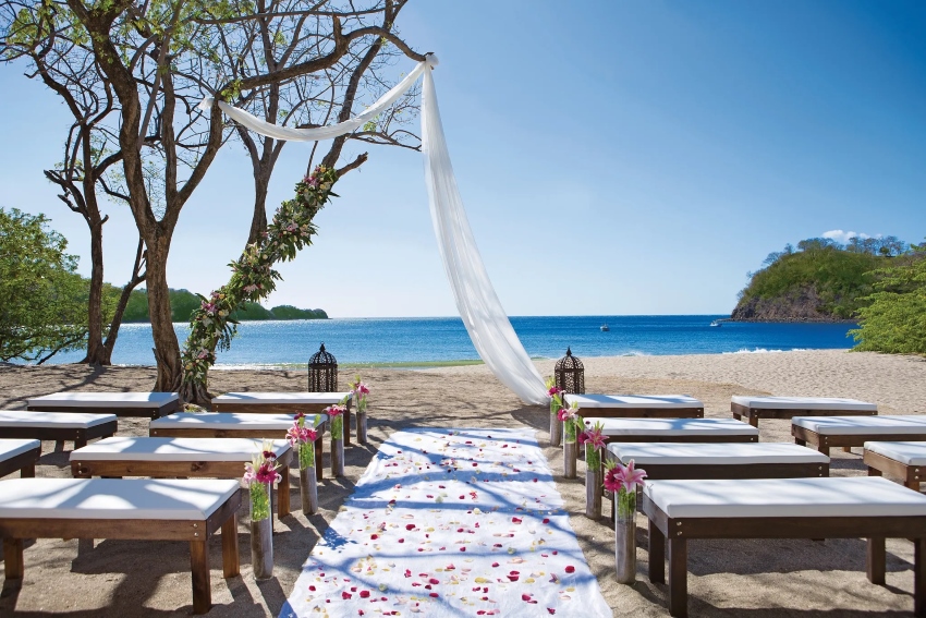 beach wedding setup at Dreams Las Mareas Costa Rica