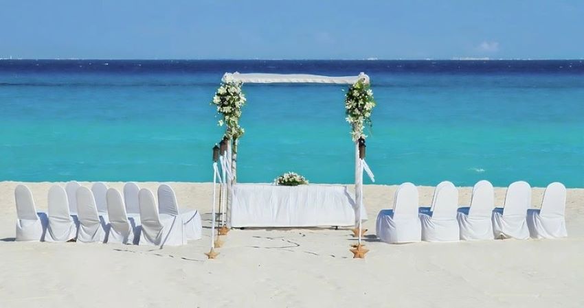 beach wedding setup at viva wyndham maya