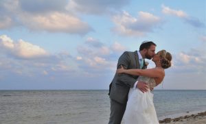 bride and groom on the beach
