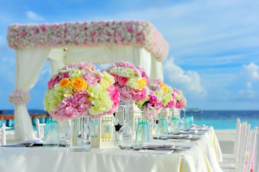 table for wedding guests on a beach