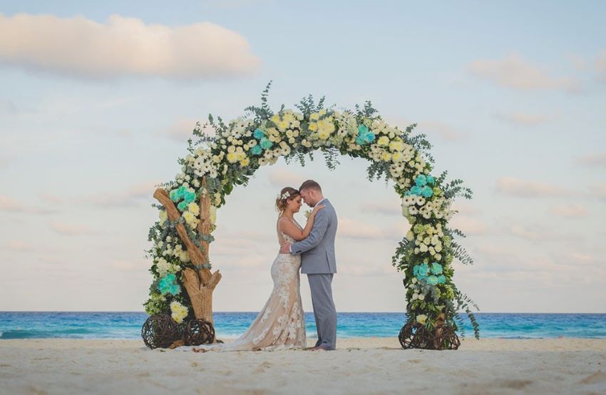 beach wedding setup at secrets the vine cancun