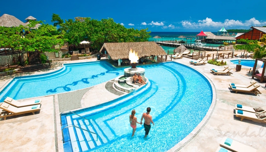 pool at sandals ochi with beach and ocean views