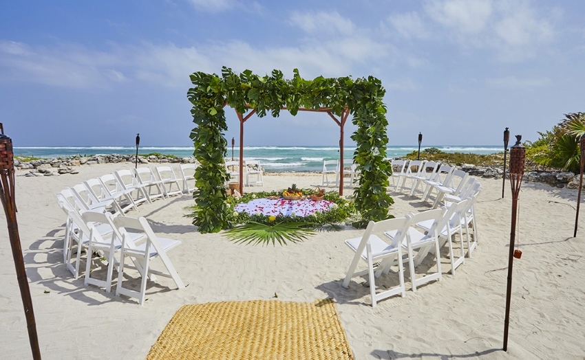beach wedding setup at bahia principe grand tulum