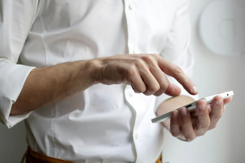 man holding a mobile phone