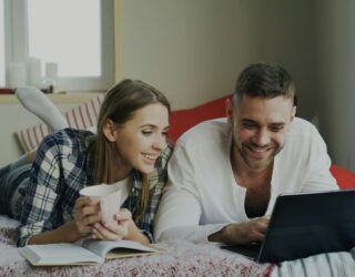 couple trying to figure out How to Budget for a Destination Wedding