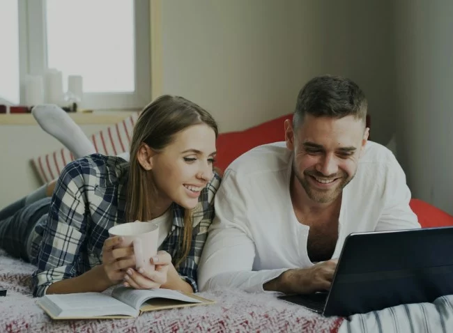 couple trying to figure out How to Budget for a Destination Wedding
