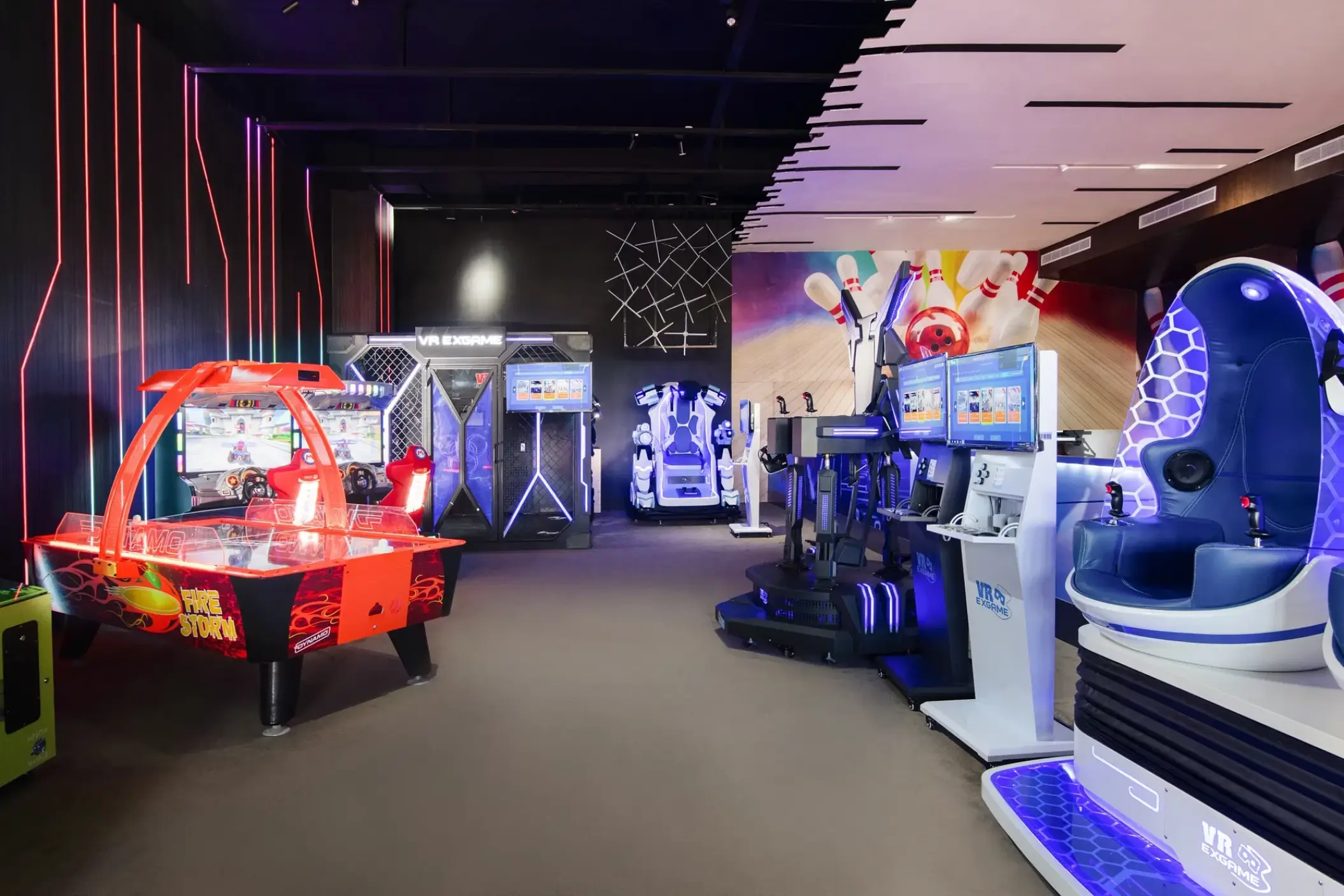 Air hockey table and video games in the arcade at Dreams Macao Beach, Punta Cana