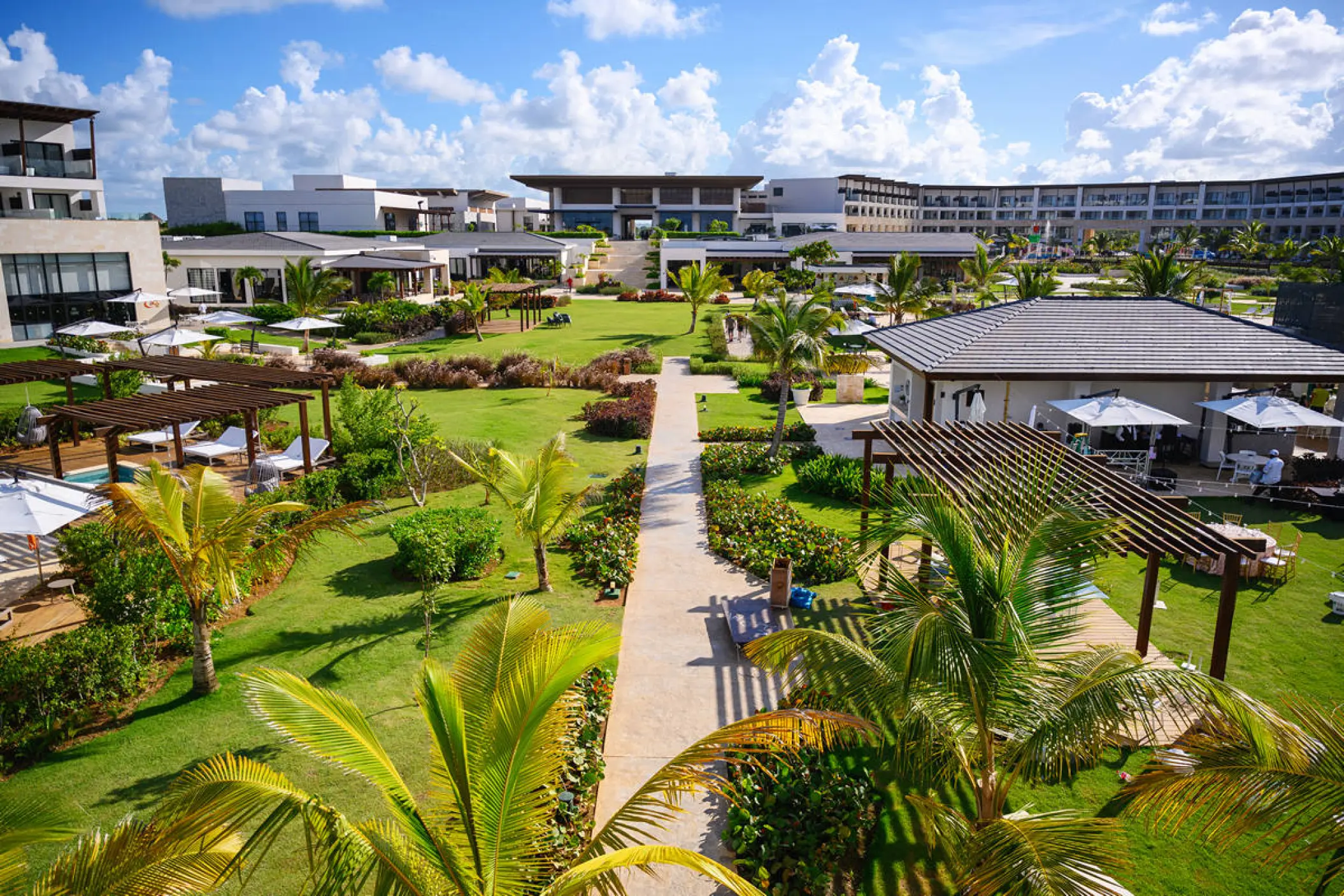 Lush tropical grounds and modern buildings at Dreams Macao, Punta Cana