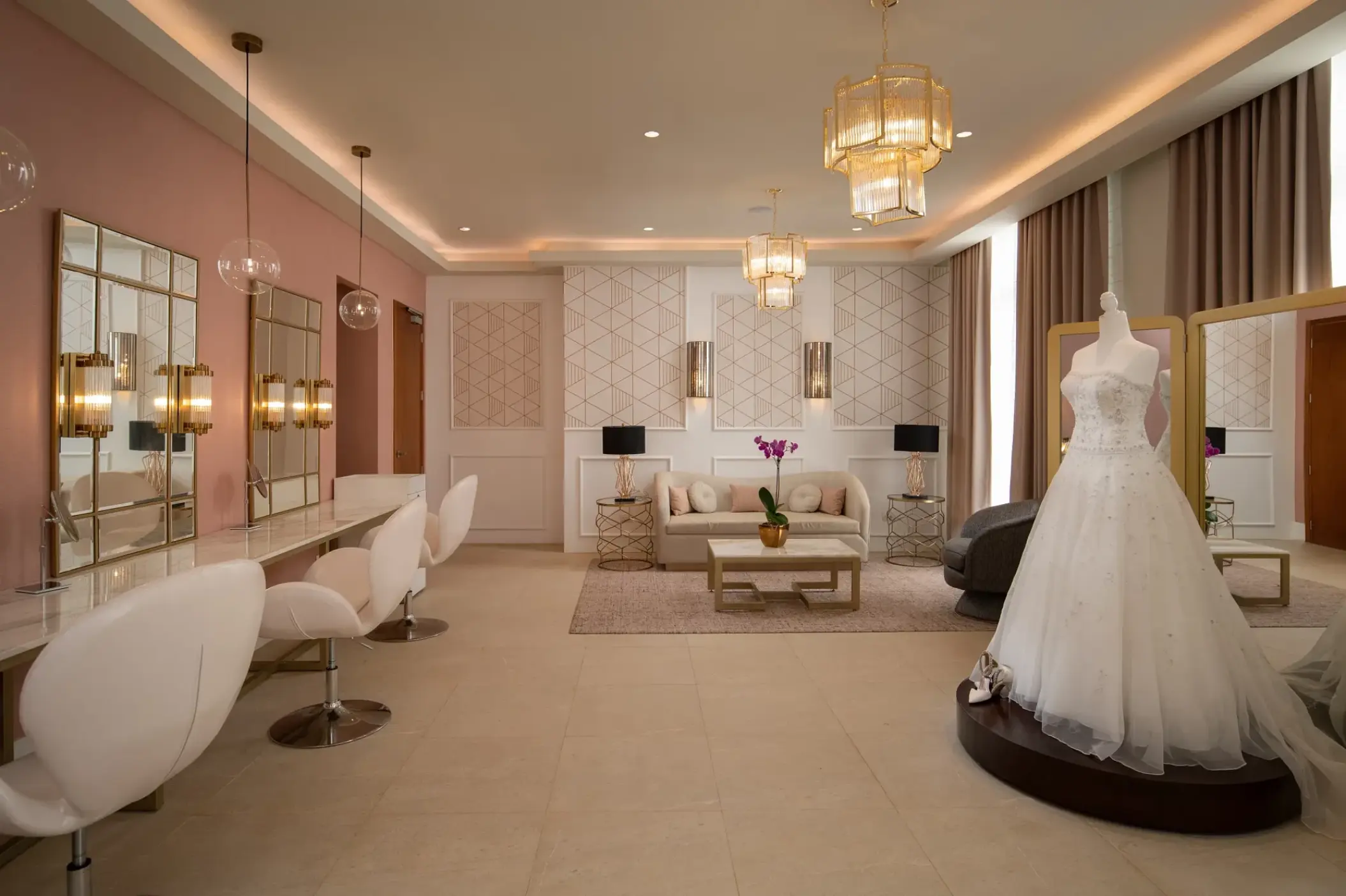 Bridal suite with mirrors, salon seating, and a wedding dress on display at Dreams Macao Beach, Punta Cana