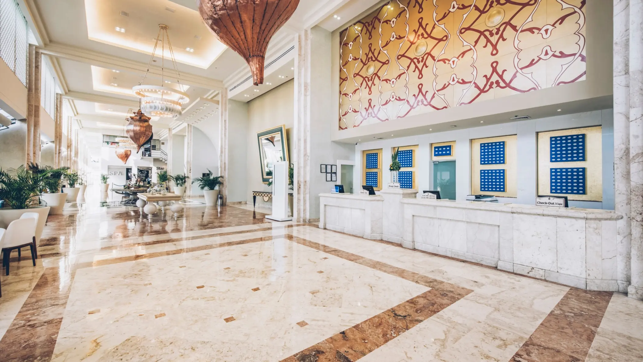 Iberostar Selection Cancun lobby with marble floors and ornate light fixtures, Cancun