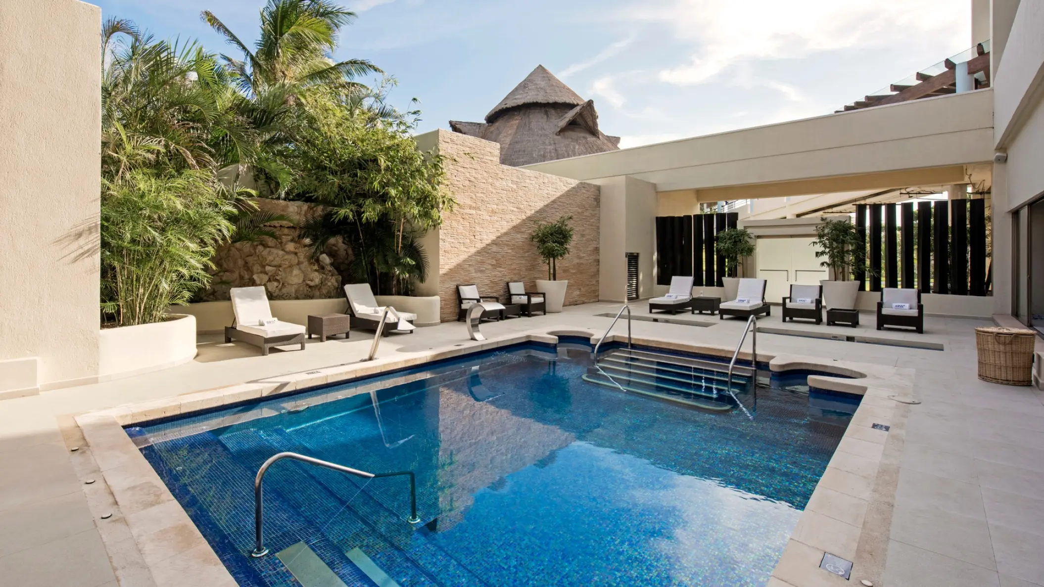 Spa pool with lounge chairs at Iberostar Selection Cancun, Cancun