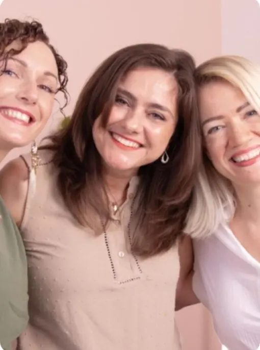 Three Paradise Weddings planners smiling together