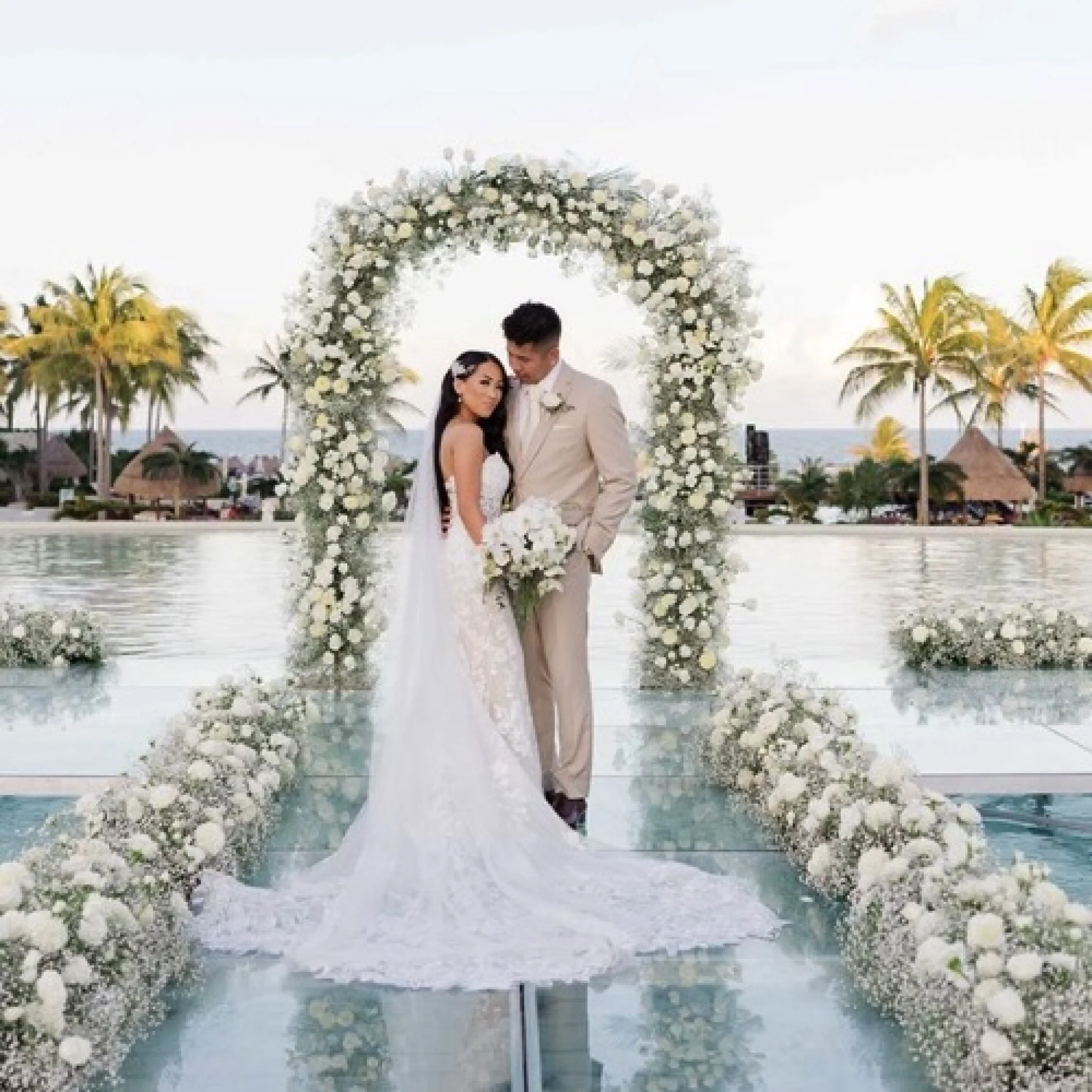 overwater wedding couple in Mexico