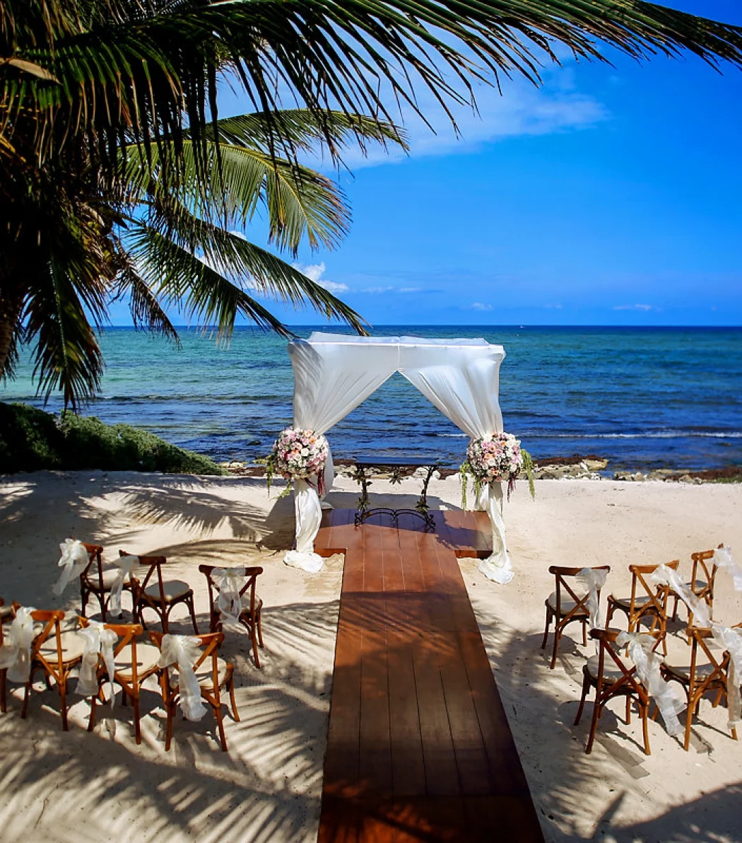 Ceremony decor in labna beach venue at akumal bay beach and wellness resort