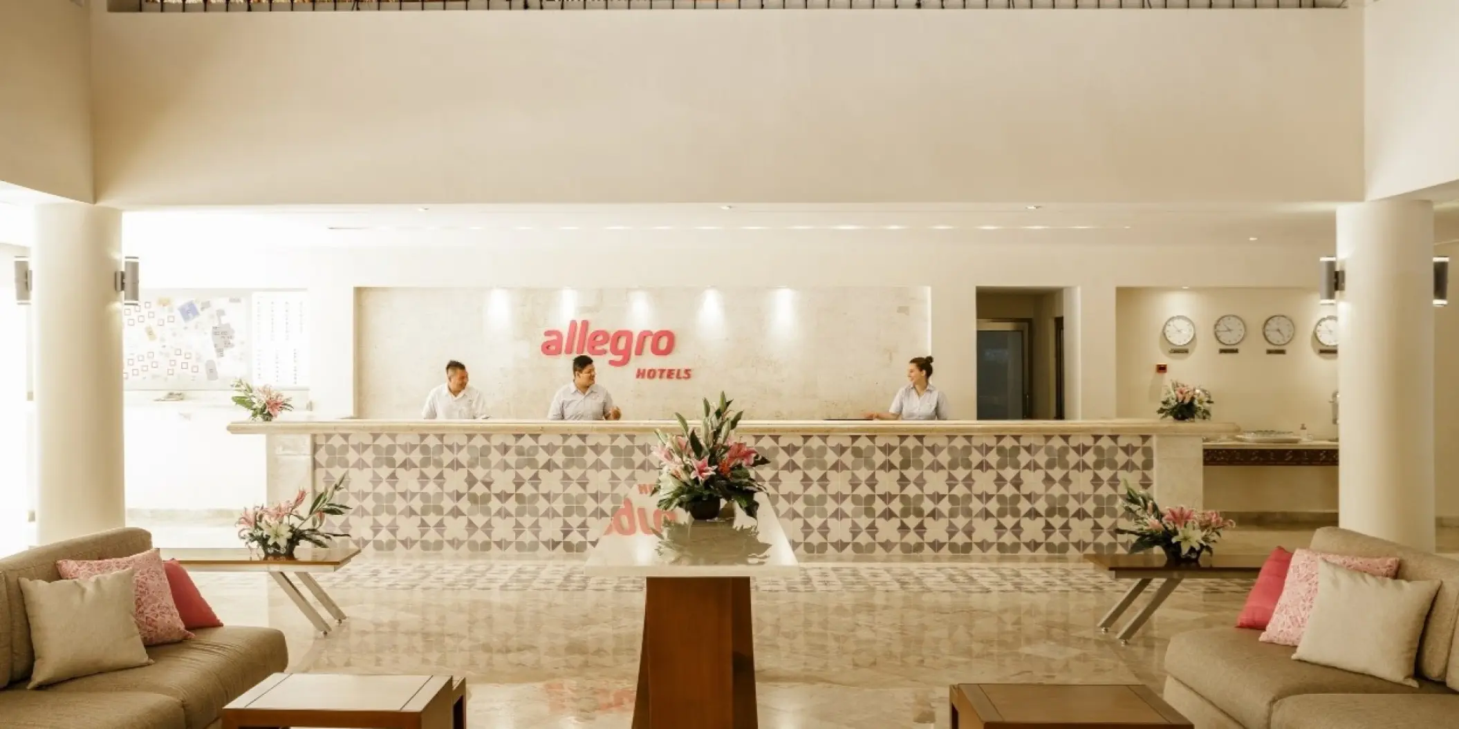 Reception desk and lobby seating area at Allegro Playacar, Playa Del Carmen
