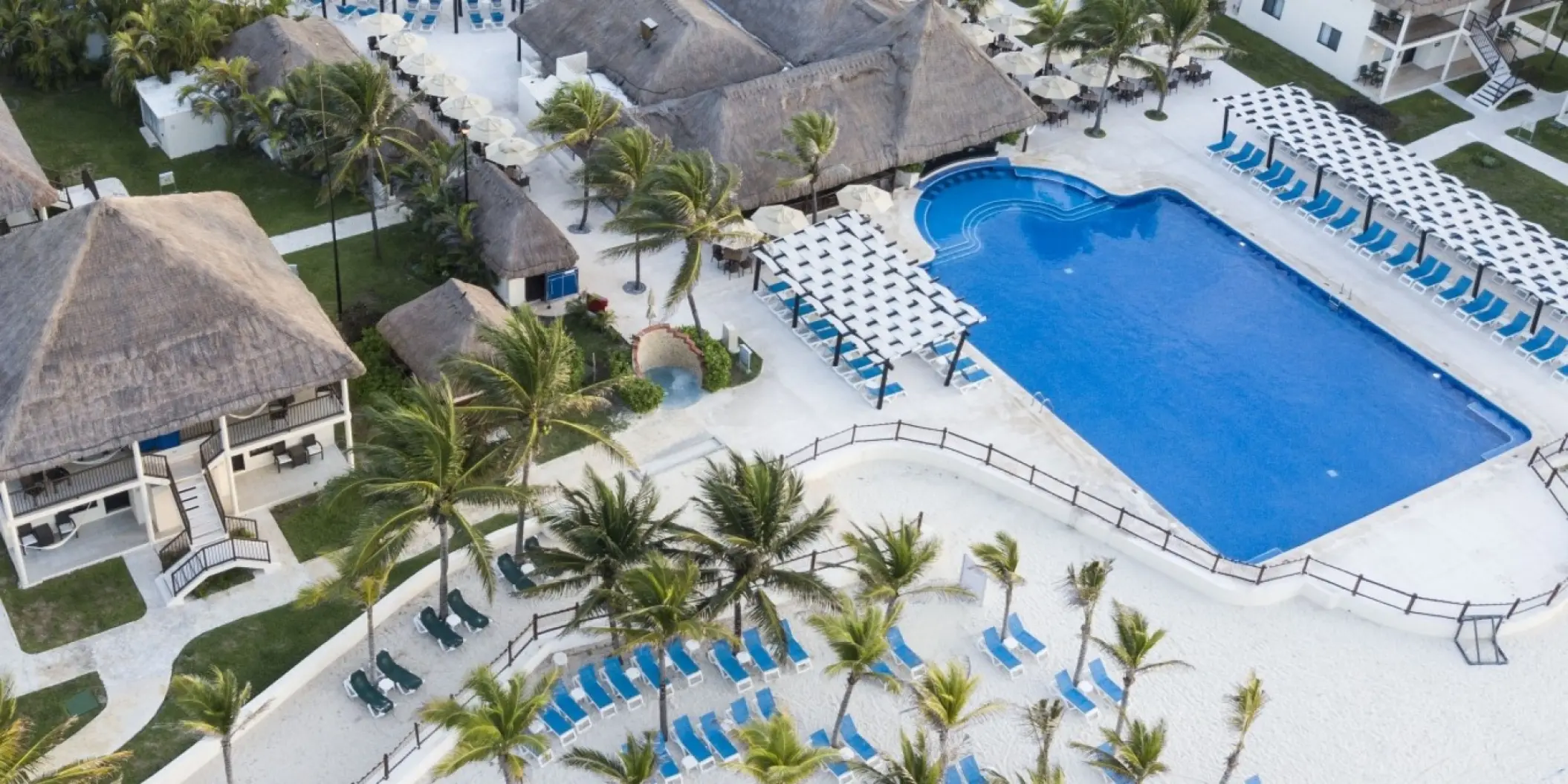 Aerial view of the swimming pool and thatched roof bungalows at Allegro Playacar, Playa Del Carmen