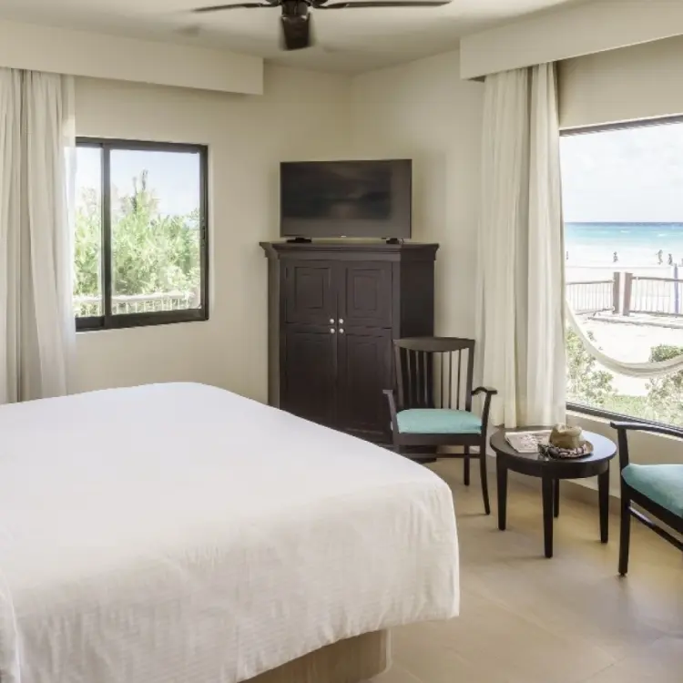 Bright guest room with ocean views and a terrace at Allegro Playacar, Playa Del Carmen