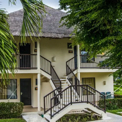 Caribbean-style bungalow suites with thatched roofs at Allegro Playacar, Playa Del Carmen
