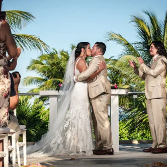Groom and bride first kiss