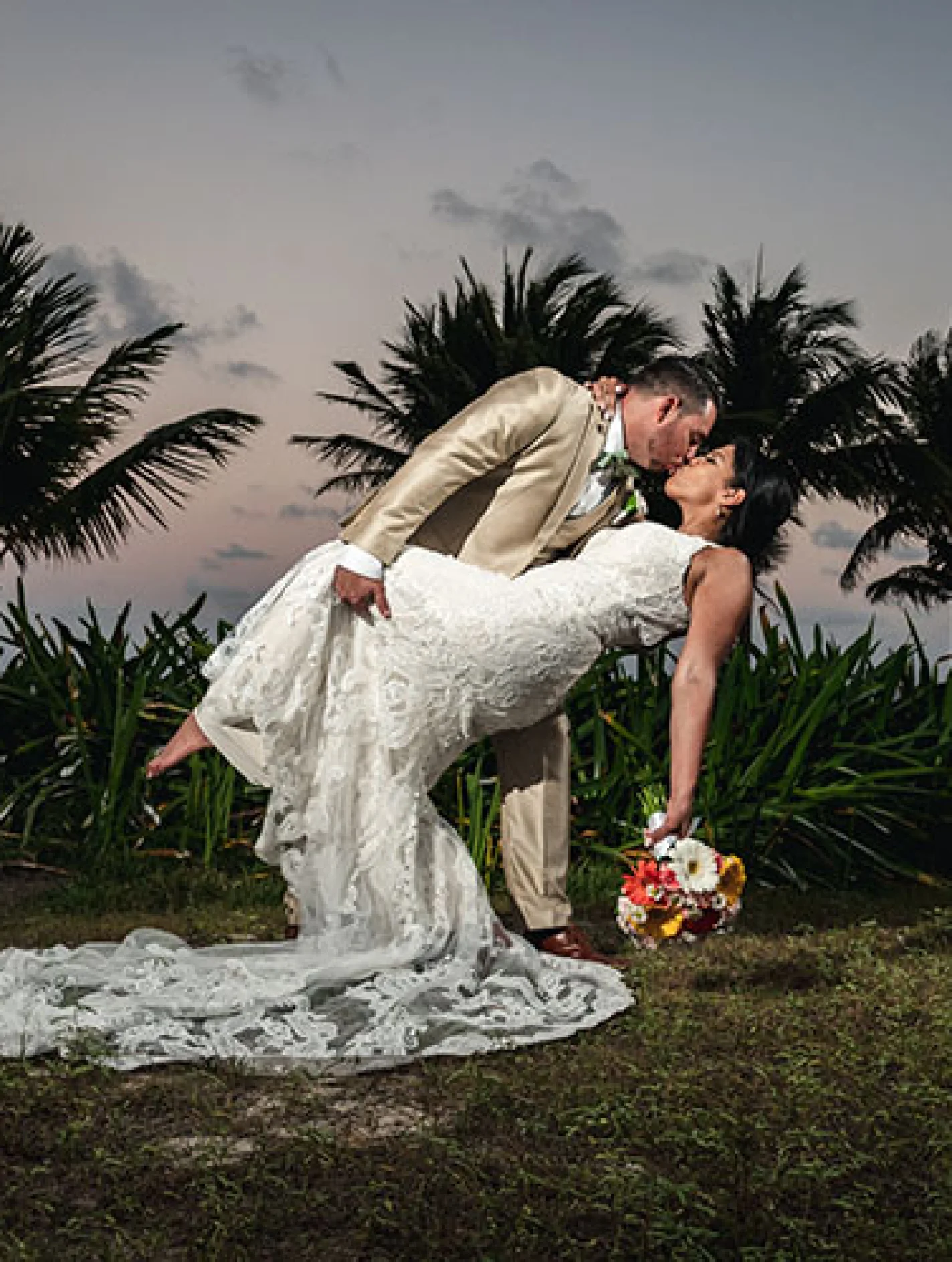 groom and bride deep kiss