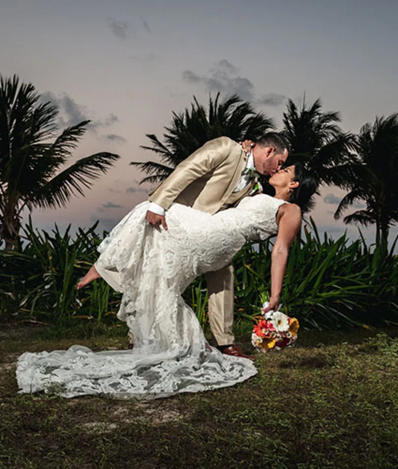 groom and bride deep kiss