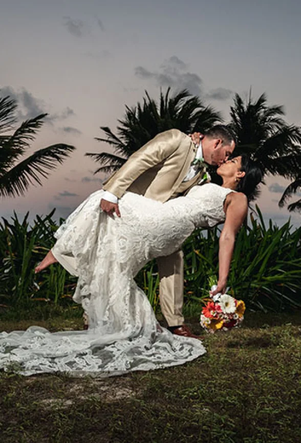 groom and bride deep kiss
