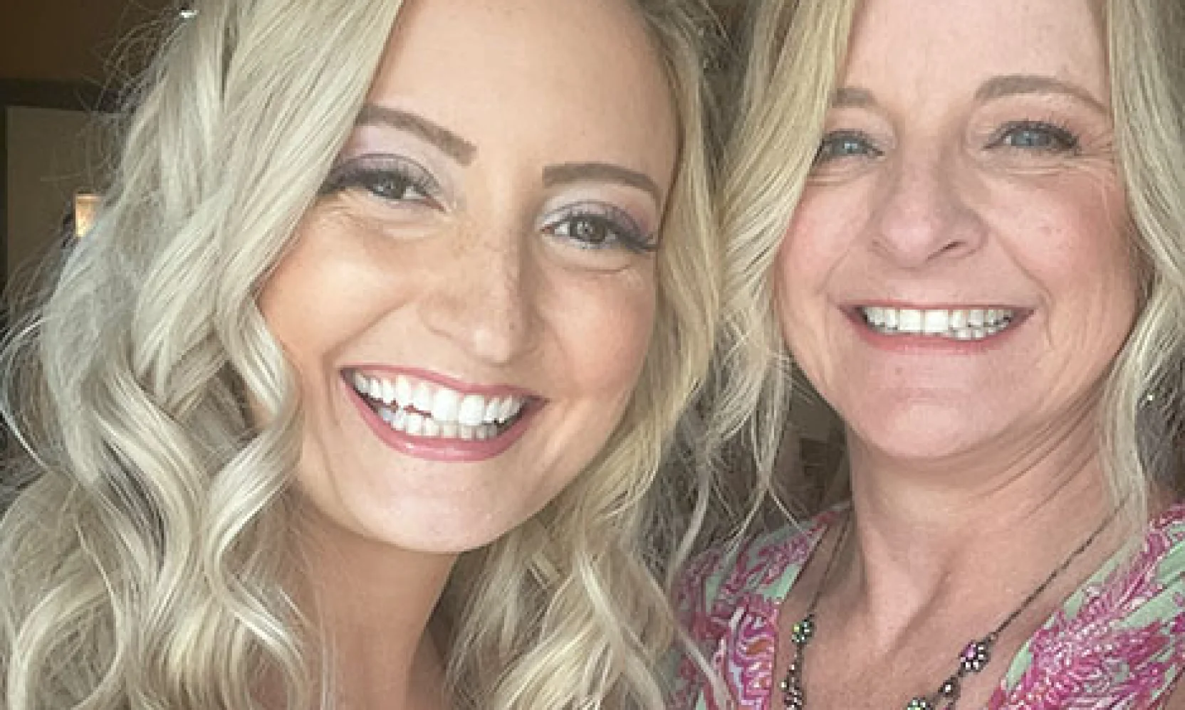 bride with mom selfie