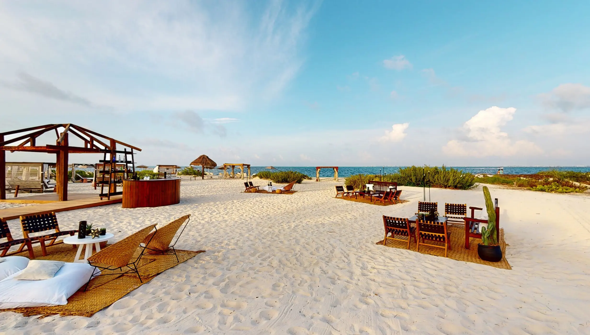 Cocktail party in beach venue at atelier playa mujeres resort