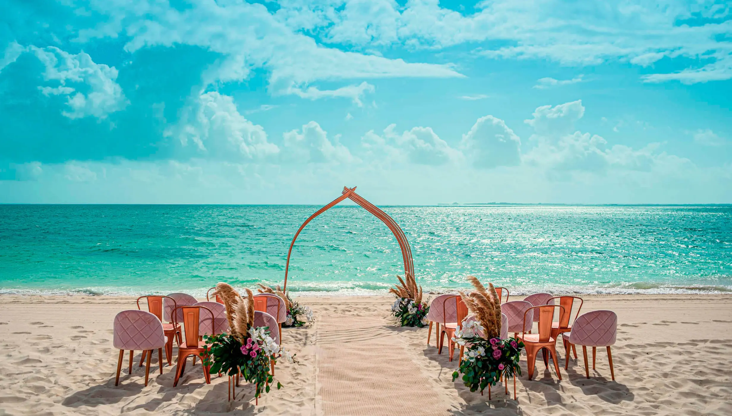 Wedding decor in beach venue at atelier playa mujeres resort
