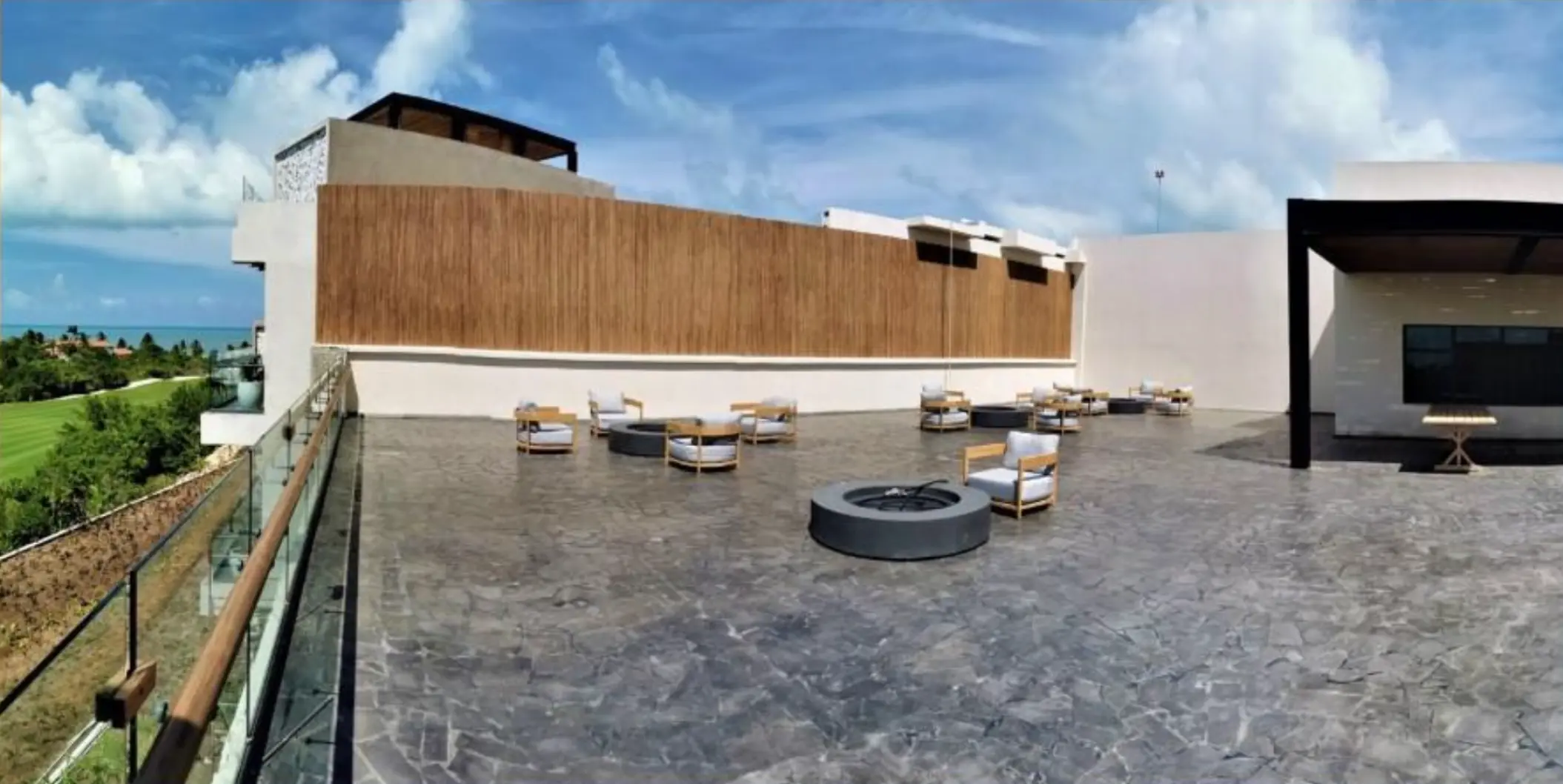Atelier Playa Mujeres Los Abrazos terrace with fire pits and lounge seating, Cancun