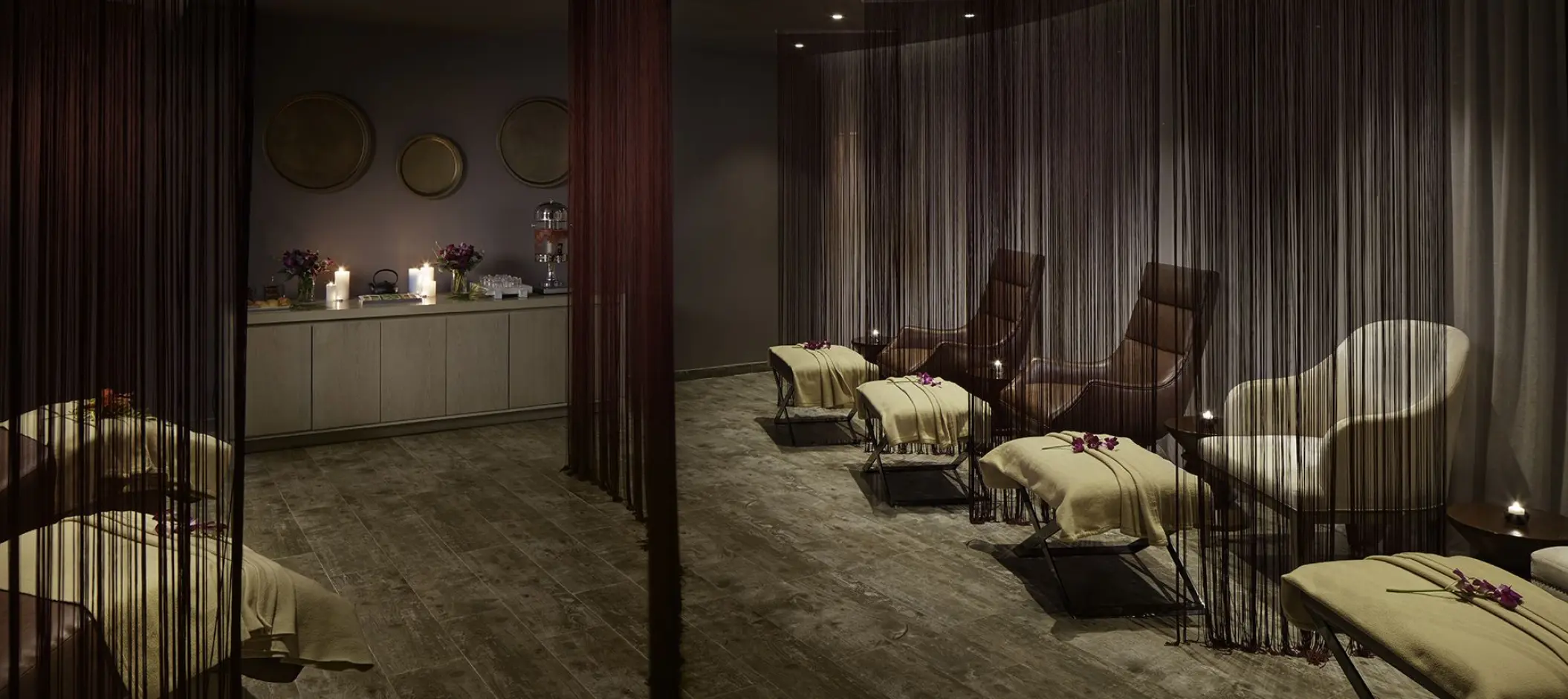 Vassa Spa relaxation lounge with curtained seating at Azul Beach Resort Negril, Jamaica