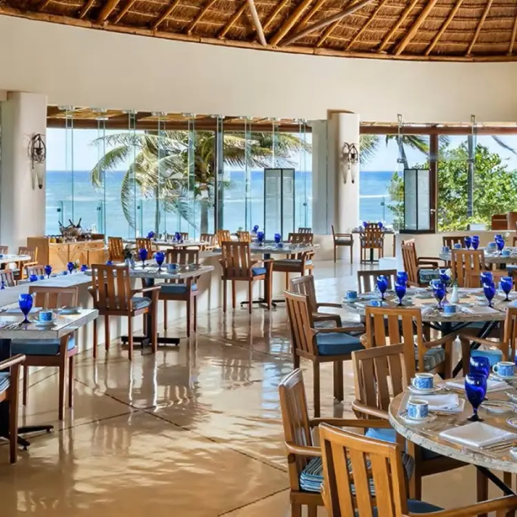 Azul restaurant with floor-to-ceiling ocean views at Grand Velas Riviera Maya