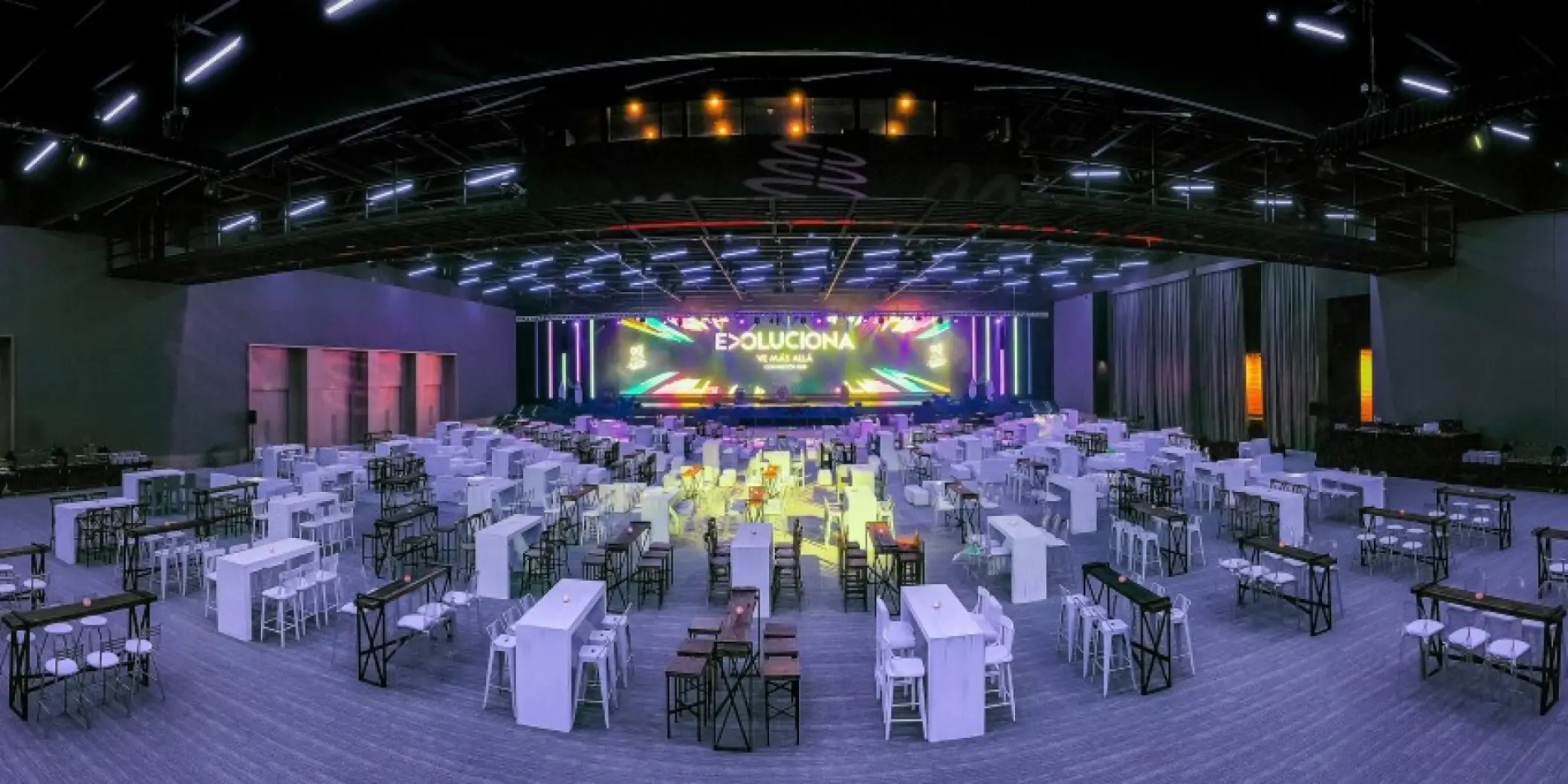 Indoor reception venue with modern table setups at Barcelo Maya Riviera, Riviera Maya